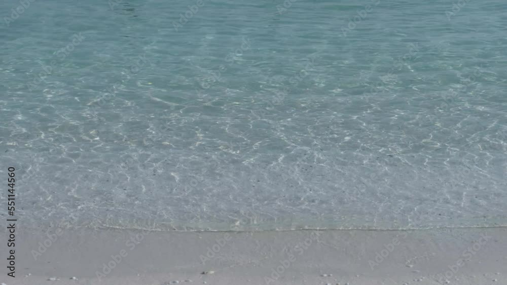 Detail of shallow clear blue sea water on the white fine sand of exotic island, Marble Beach in Thassos Island Greece Detail of shallow clear blue sea water on the white fine sand of exotic island, Marble Beach in Thassos Island Greece
