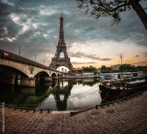 Eiffel Tower be seine river at sunrise in Paris. France