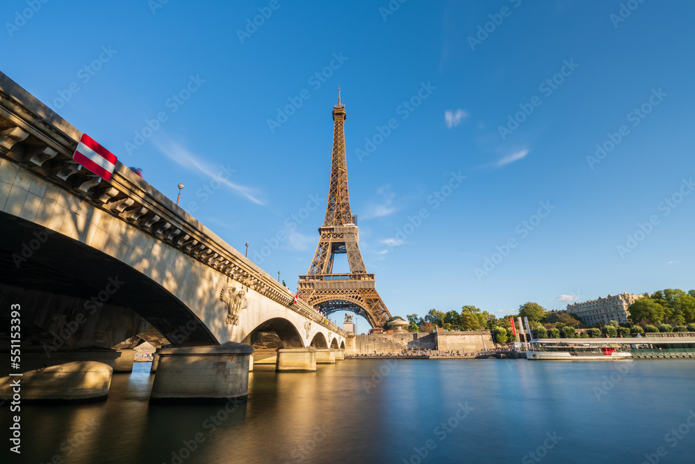 Fototapeta premium Eiffel Tower by Seine river in Paris