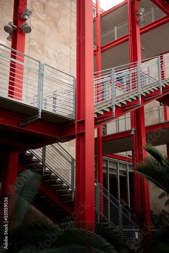 Vertical shot of red stairs outside the Los Angeles County Museum of Contemporary Art building photo