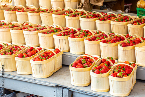 Baskets of strawberries at a farmers' market