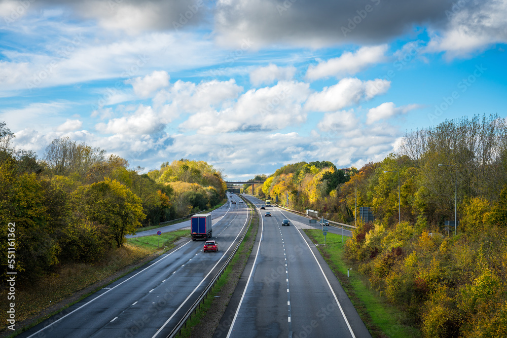 Dual carriageway road in autumn. England Dual carriageway road in autumn. England