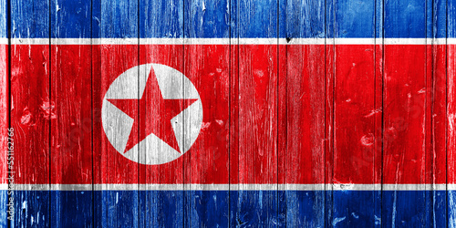 Flag of North Korea on a textured background. Concept collage.
