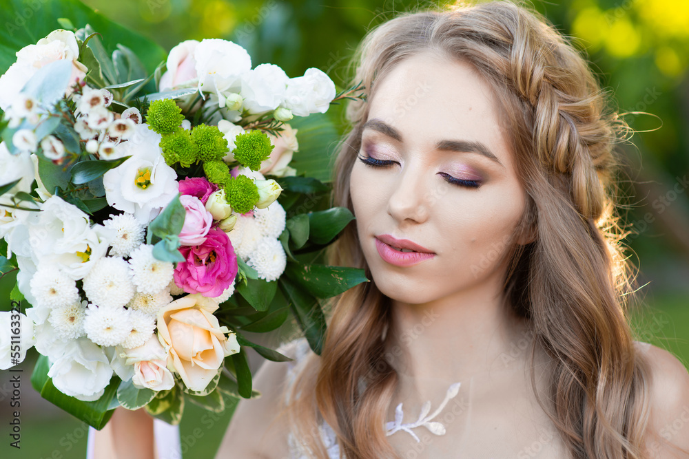 portrait of a beautiful bride who closed her eyes in a white wedding dress in the garden, close-up portrait of a beautiful bride who closed her eyes in a white wedding dress in the garden, close-up