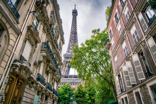 Eiffel Tower capture between buildings in Paris. France
