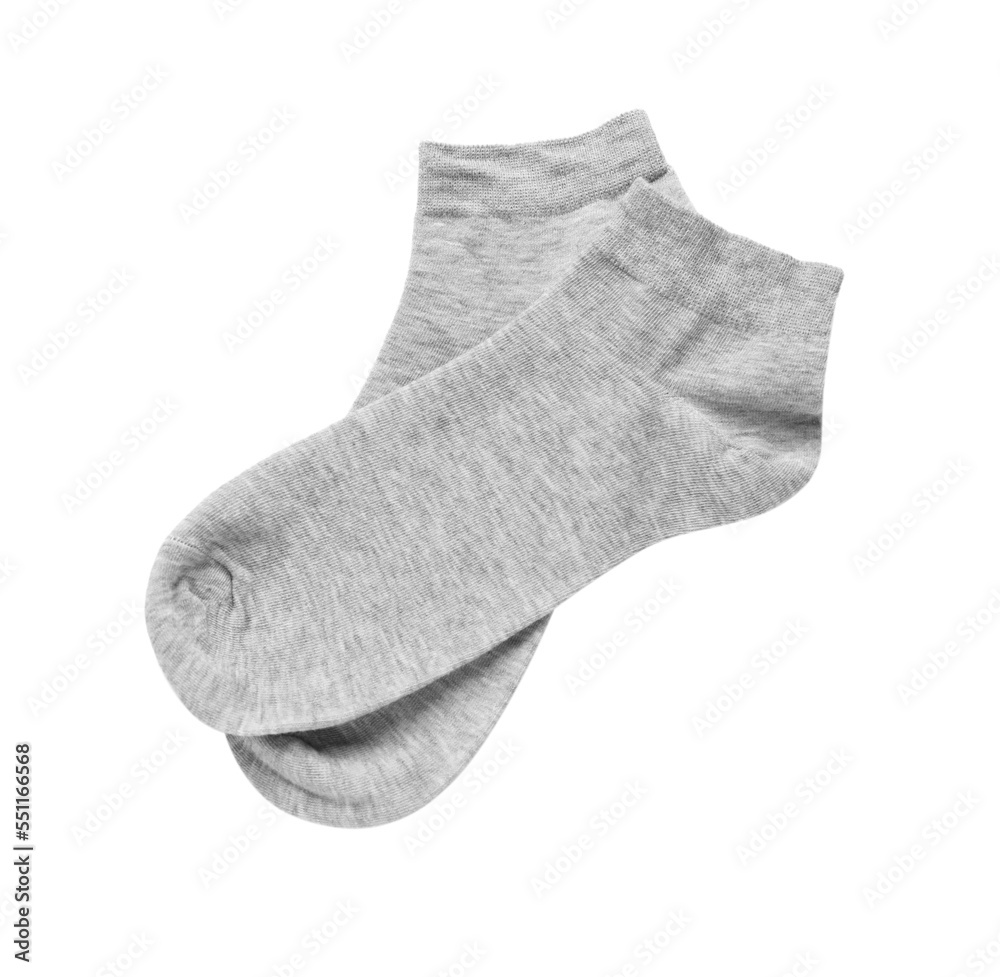 Pair of grey socks on white background, top view