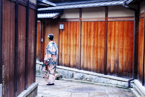 Wooden panels of a traditional Japanese house in Kyoto, creating a regular vertical pattern