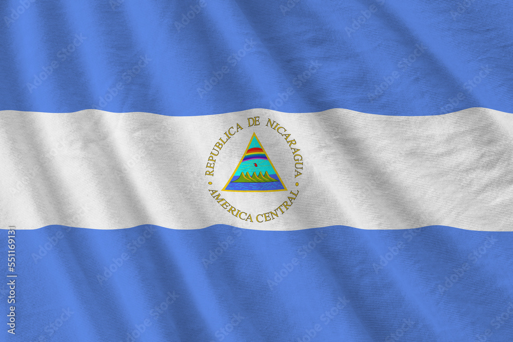 nicaragua-flag-with-big-folds-waving-close-up-under-the-studio-light