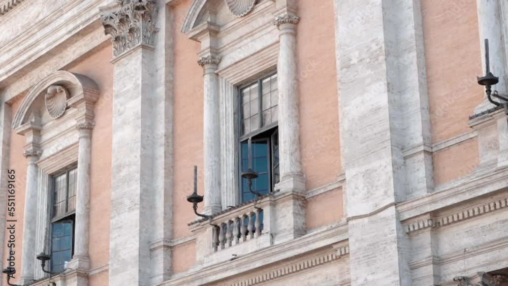 Majestic architectural building facade on Piazza del Campidoglio in Rome, building decorated with marble frames, columns and sculptures. Architectural heritage of Italy Majestic architectural building facade on Piazza del Campidoglio in Rome, building decorated with marble frames, columns and sculptures. Architectural heritage of Italy