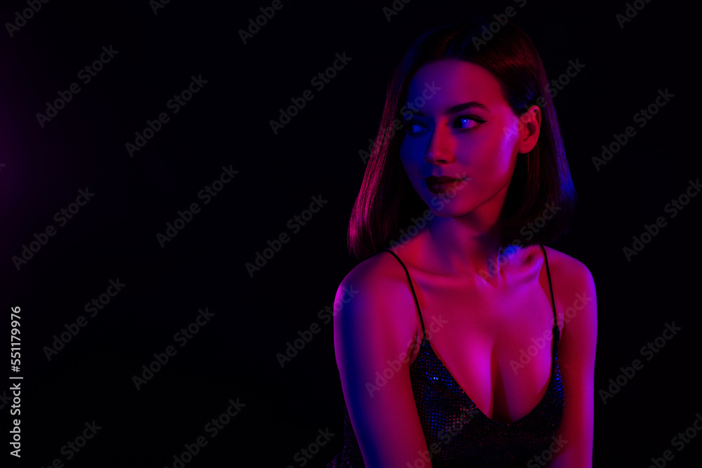 Amazing lady with provocative playful eyes looking side empty space express flirt to handsome guy at vip event dark hall Amazing lady with provocative playful eyes looking side empty space express flirt to handsome guy at vip event dark hall
