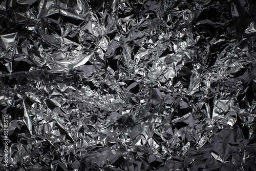 metallic crumpled aluminium foil textured background chrome tinfoil abstract