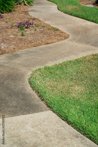 Curved concrete pavement near the grass- Destin, Florida