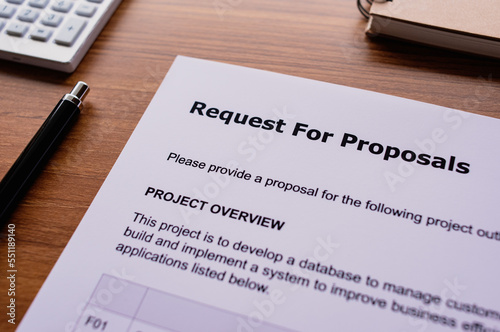 Foto There is dummy documents that created for the photo shoot on the desk about Request For Proposal