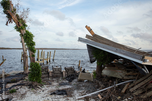 debris piled up on bridge in Matlaeshe Island, Cape Coral. photo