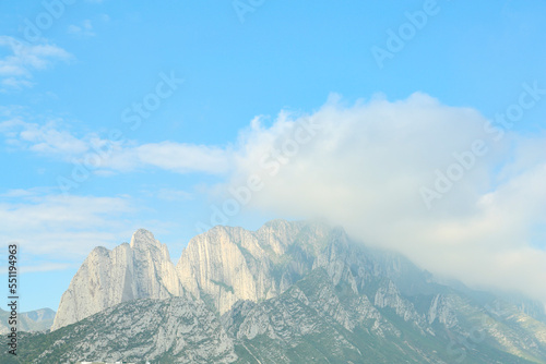 Majestic mountain landscape covered with greenery on cloudy day