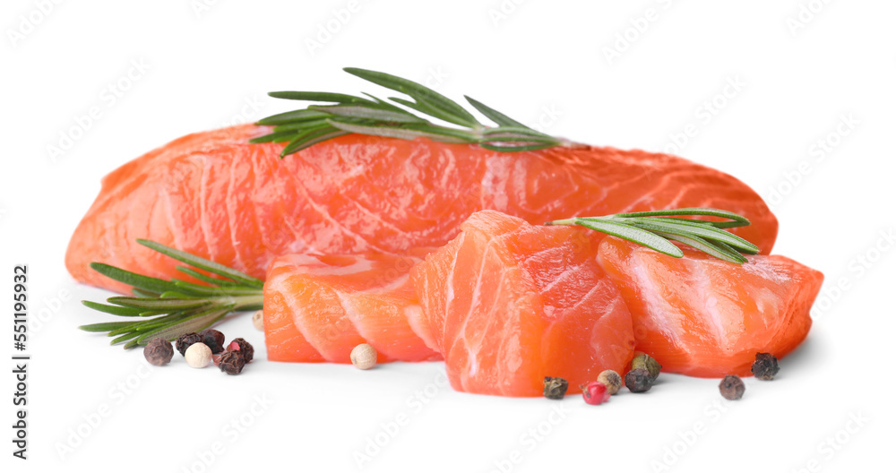 Pieces of fresh raw salmon and spices on white background Pieces of fresh raw salmon and spices on white background