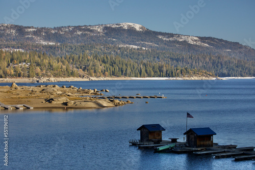 Картината върху платно exposed shoreline and empty boat docks signal the start of winter at shaver lake