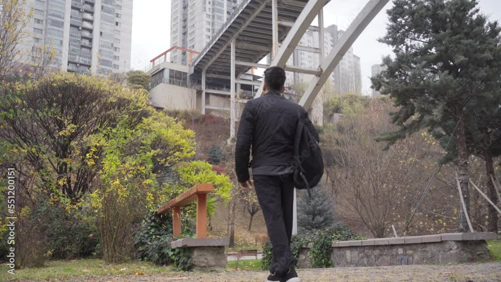 Sad lonely young man looking thoughtfully at the city.
Sad young man walking in the city center is depressed. Country life. Clutter.
Sad lonely young man looking thoughtfully at the city.
Sad young man walking in the city center is depressed. Country life. Clutter.