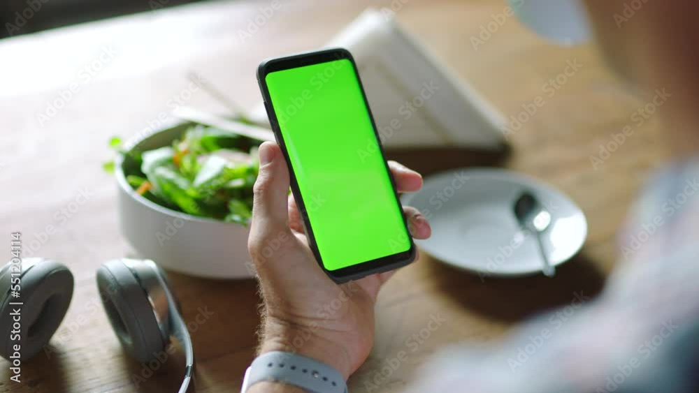 Businessman, hands or green screen phone in coffee shop, restaurant or cafe on social media app or calendar management. Zoom, worker employee or mobile technology mockup of office logo on lunch break