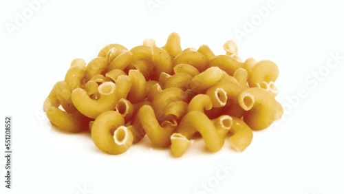 spiral pasta isolated on white background