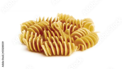 spiral pasta isolated on white background
