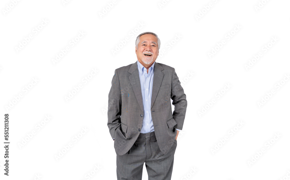 A cheerful elderly man with gray hair and a beard, wearing a gray suit and blue shirt, standing with his hands in his pockets against a white background.
A cheerful elderly man with gray hair and a beard, wearing a gray suit and blue shirt, standing with his hands in his pockets against a white background.