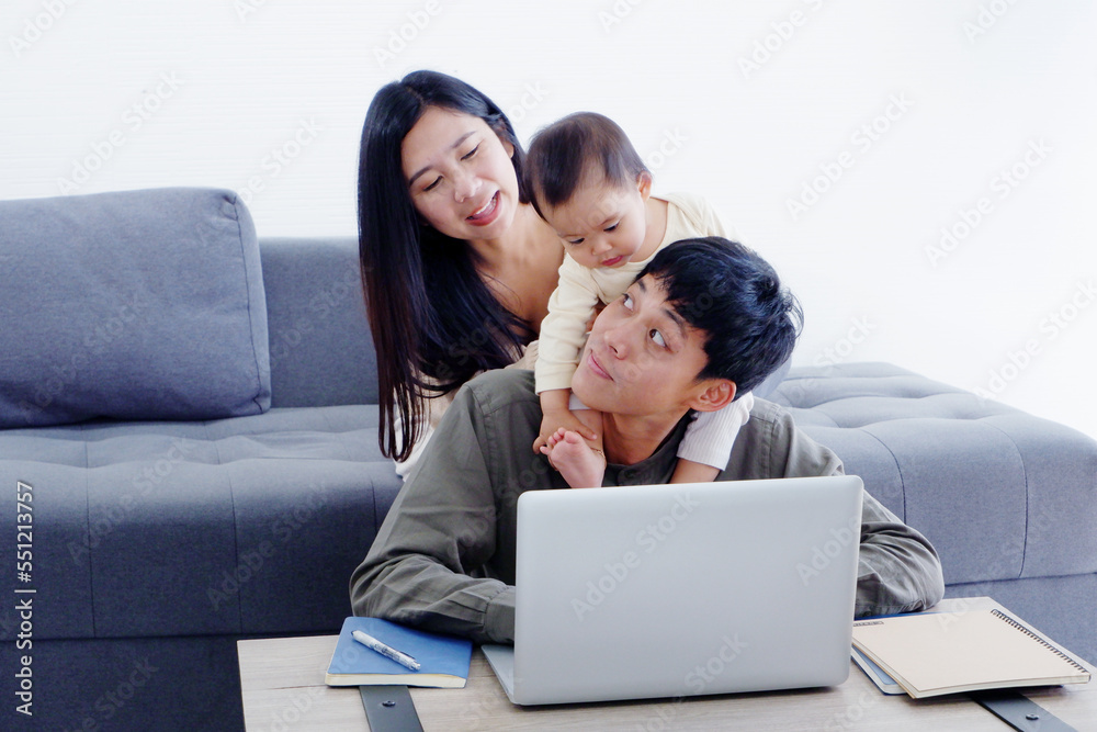 parents family And a cute little baby smiles happily. parents family And a cute little baby smiles happily.
