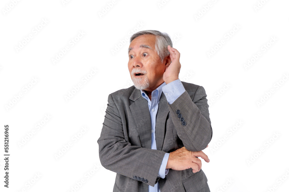 Elderly man in a suit, cupping his hand to his ear as if trying to hear something. Elderly man in a suit, cupping his hand to his ear as if trying to hear something.