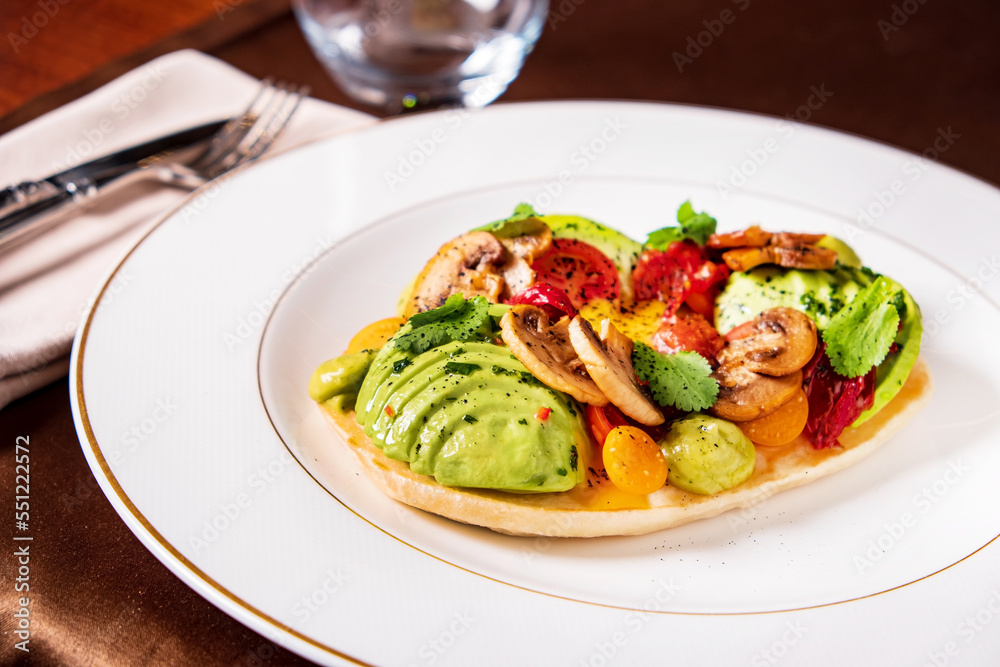 gourmet pancake with vegetables and sauce