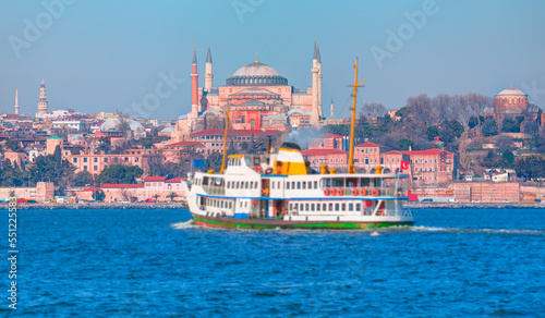 Famous historical peninsula of Istanbul - Hagia sophia, Hagia Irene Museum - Water trail foaming behind a passenger ferry boat - Bosphorus, Istanbul