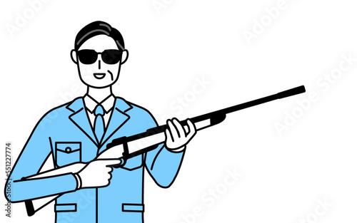 サングラスをかけてライフル銃を持つ作業着を着た男性（経営者、管理職、工場長）