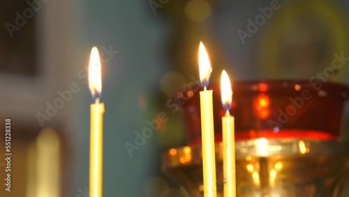 Lighted candles in a church photo