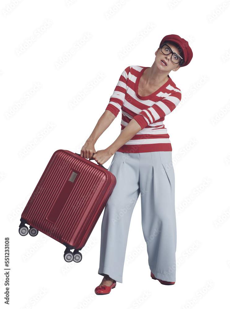 Woman carrying a heavy suitcase Woman carrying a heavy suitcase