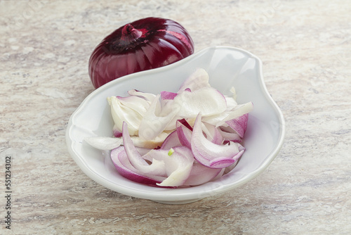 Sliced red onion in the bowl