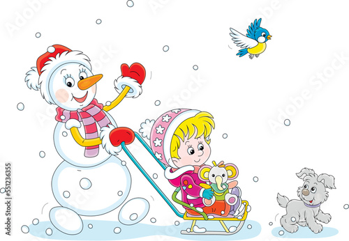 Funny snowman sledging a happy cute little girl with a toy baby elephant and walking and playing with a merry pup and a small bird on a snowy winter day, vector cartoon illustration on white