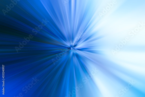 Blue, colorful, bright speed lines. Motion blur background graphic style. The light speeds from the center of the image and radiates to the side. © sutthichai