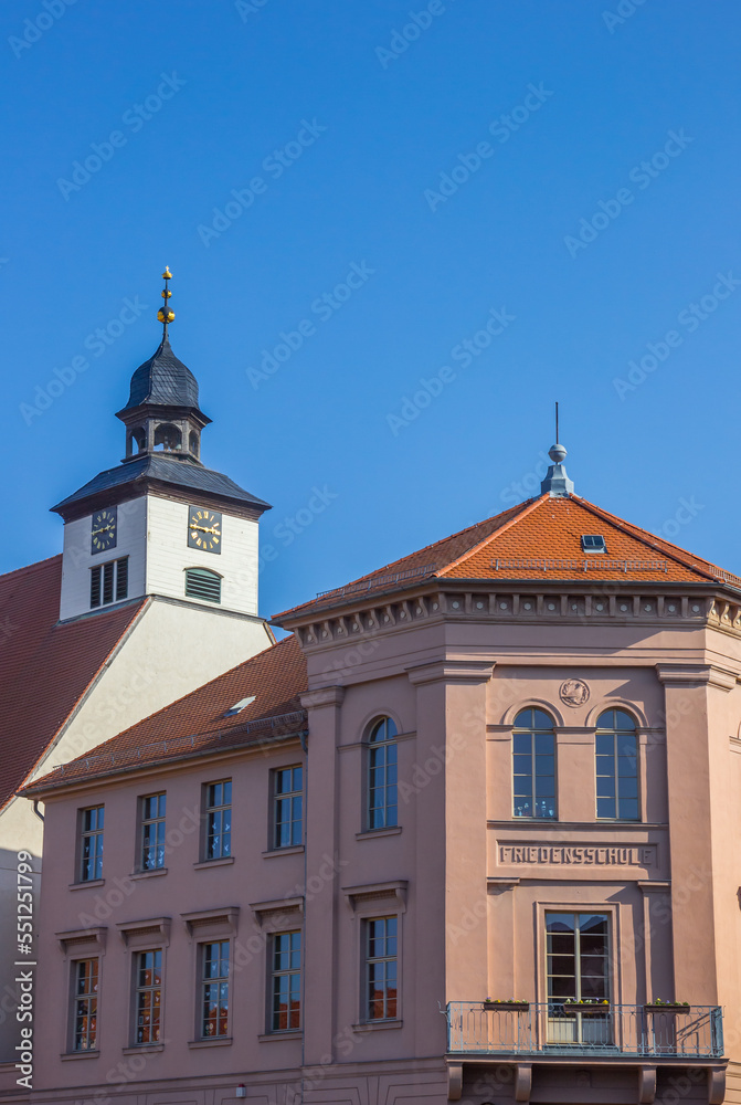 Historic school and church tower in Kothen (Anhalt), Germany