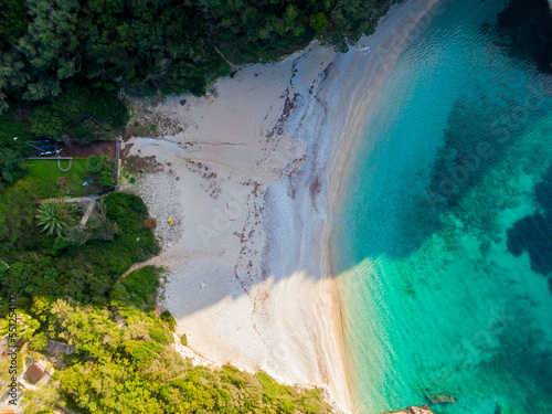 Aerial drone view of Rovinia Beach in liapades, Corfu, Greece