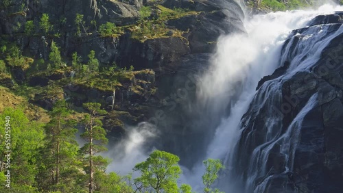 Magnificent nature of Norway. Hardangervidda National Park. Norway landscape with waterfall, river and mountains. 4K, UHD slow motion photo