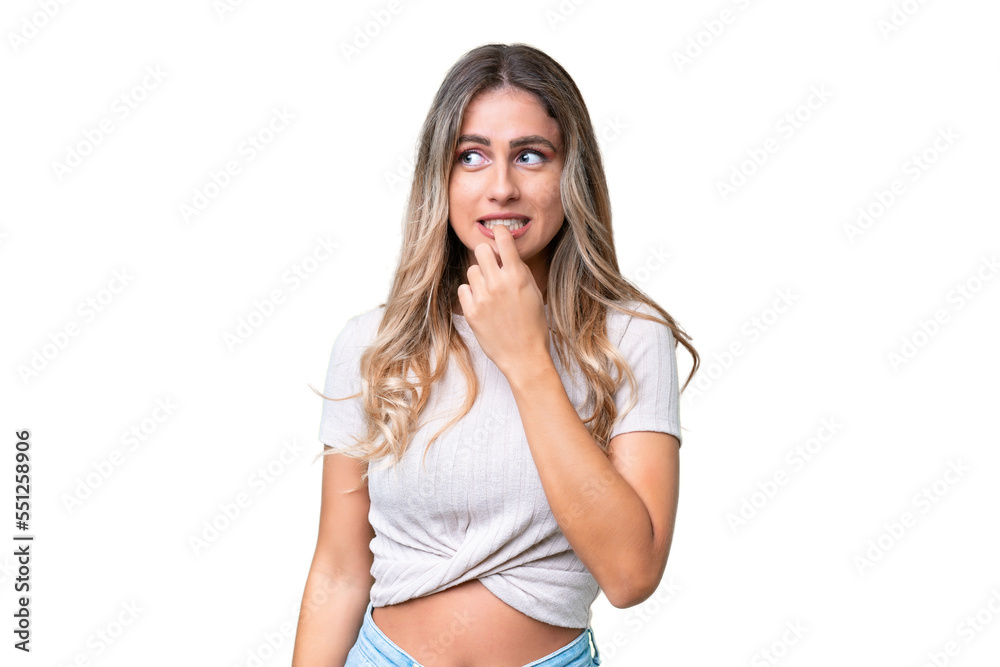 Fototapeta premium Young Uruguayan woman over isolated background nervous and scared