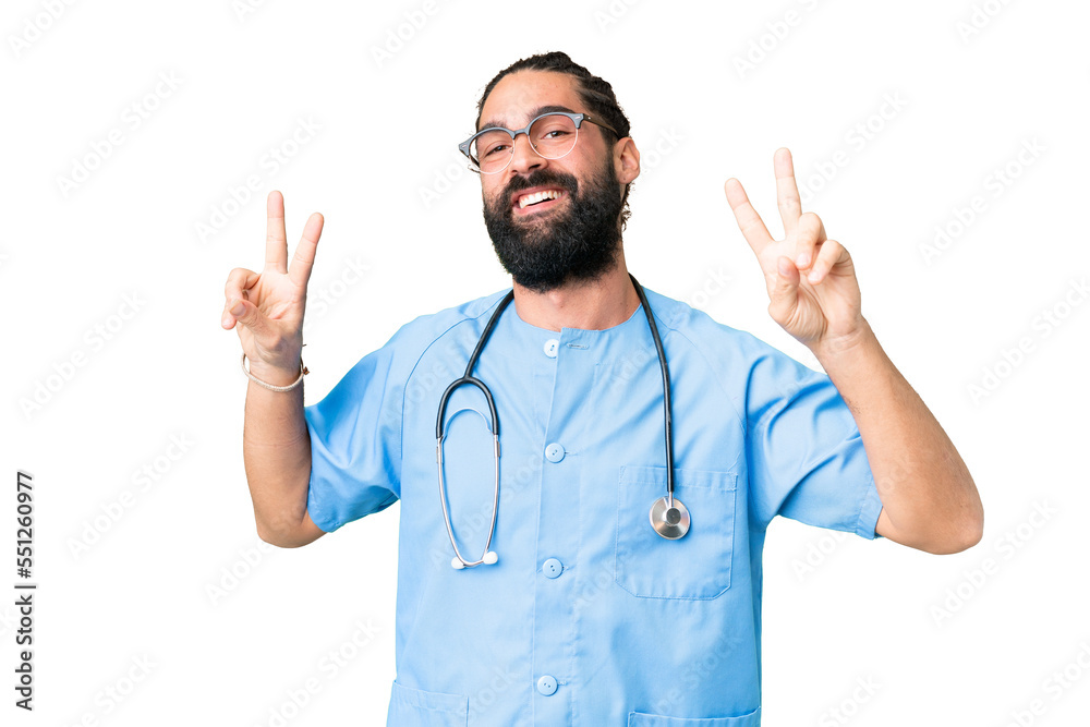 Young doctor man over isolated chroma key background showing victory sign with both hands Young doctor man over isolated chroma key background showing victory sign with both hands