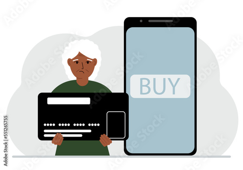 A woman holds a huge credit card next to a smartphone with a Buy button on the screen. The concept of online payments with payment via mobile phone.