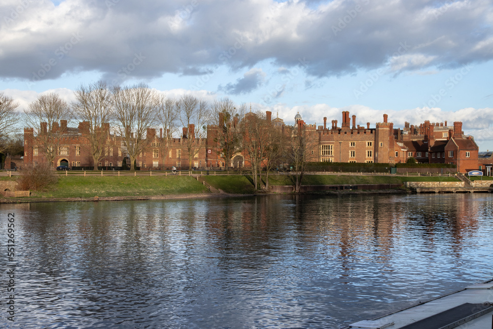 Hampton Court Palace Tudor exterior on to the River Thames in spring