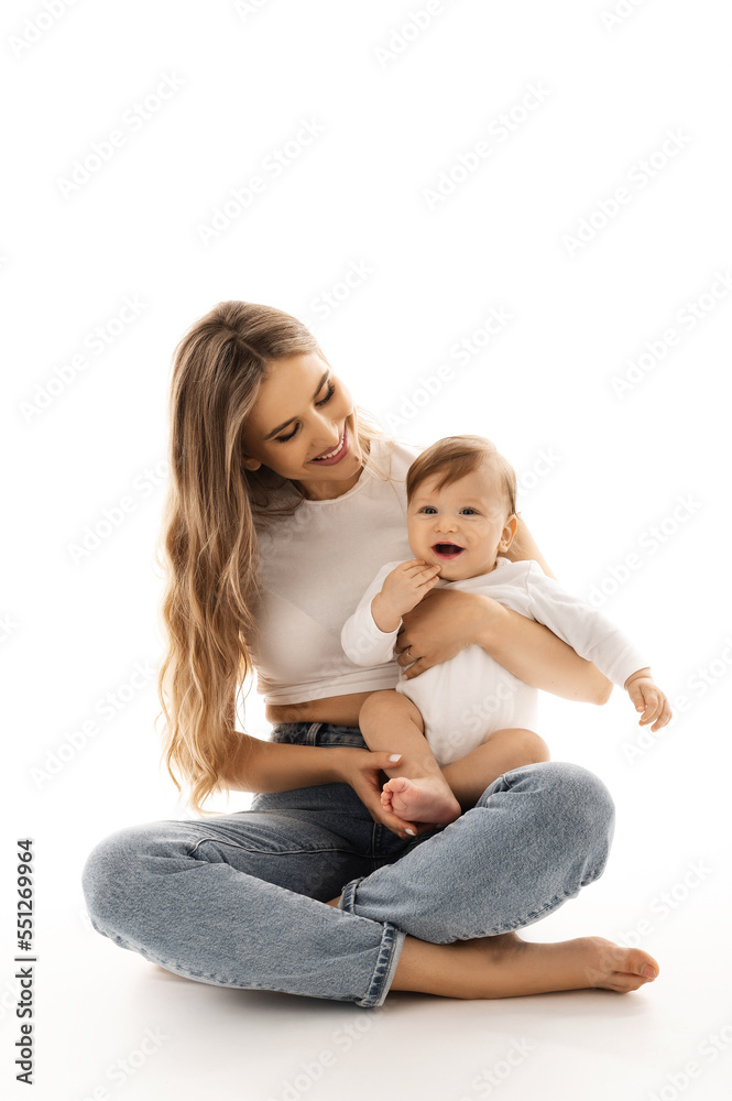 mother and child, the mother is holding the baby. mother and child, the mother is holding the baby.