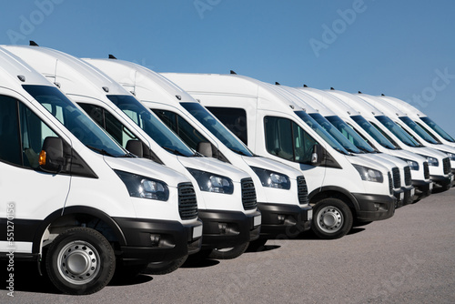 Fototapeta Delivery vans are parked in rows. Commercial fleet