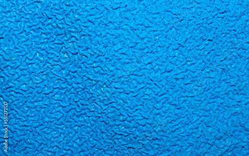 The texture is swollen blue rubber.The texture is blue rubber foam.Sound insulation of the rubberized blue surface.
