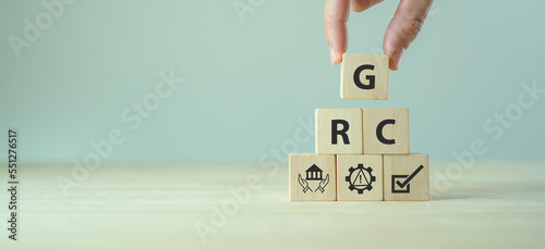GRC Governance Risk and Compliance concept. Structuring way to align IT with business goals. Reduce wastage, increase efficiency, reduce noncompliance risk, and share information more effectively. photo