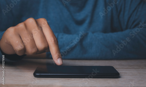 Young man using smartphone.