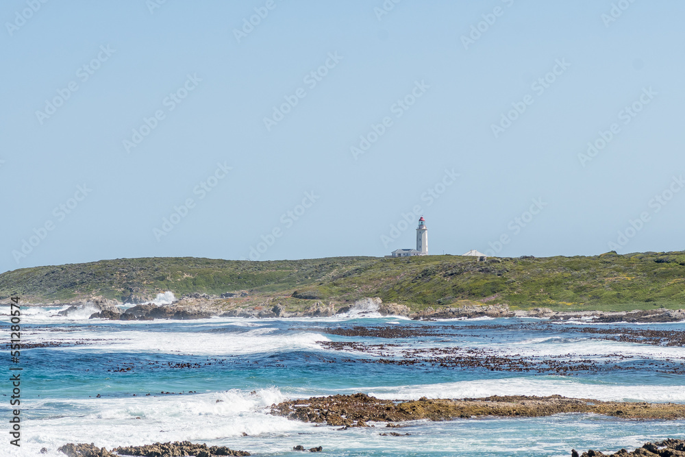 Danger Point Lighthouse is visible across Kruismans Bay near Gansbaai Danger Point Lighthouse is visible across Kruismans Bay near Gansbaai