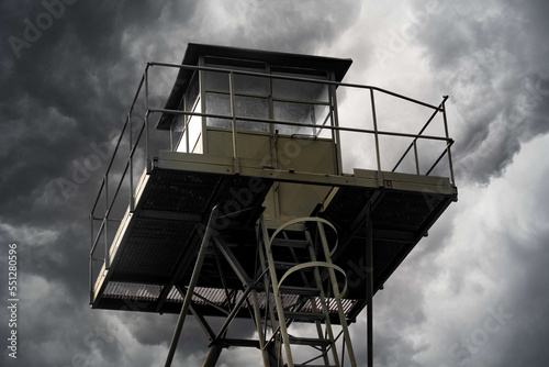 Metal construction of the watchtower, clouds in the background